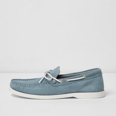 Light blue suede boat shoes